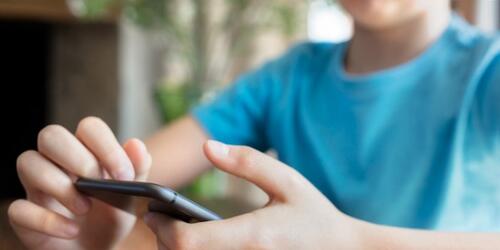Teenage boy on phone